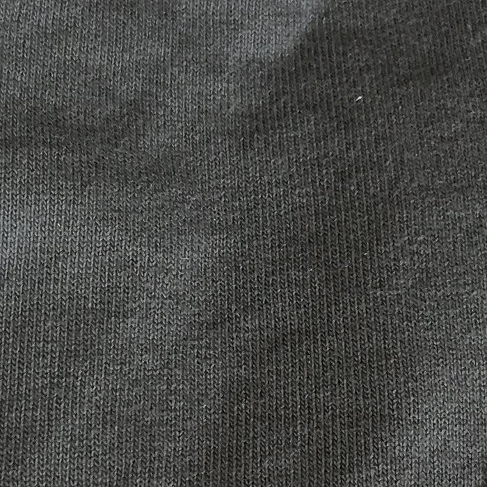 Close up of the olive grey jersey fabric.