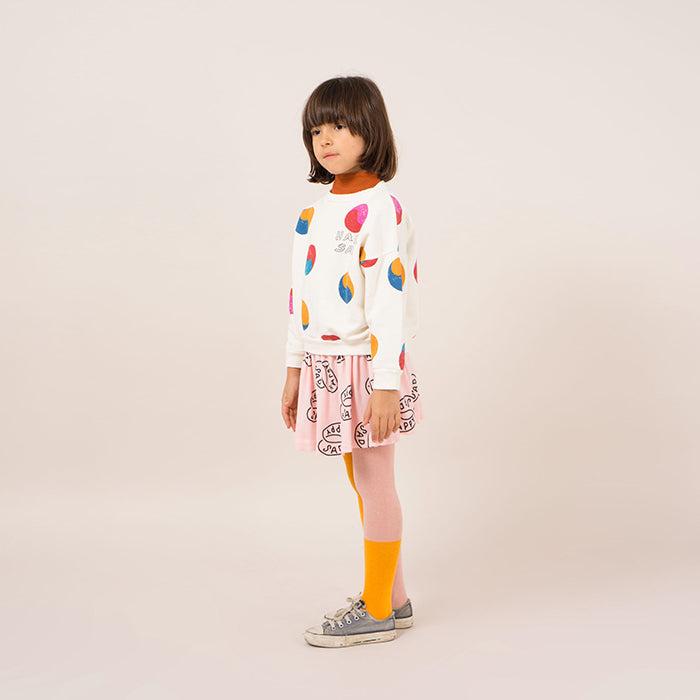 Girl wearing pink and yellow colour-blocked tights.