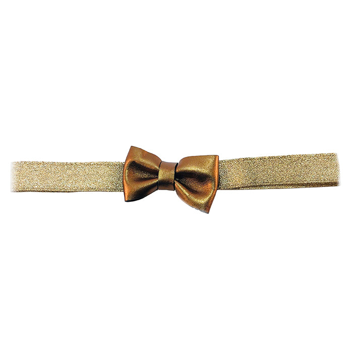 Gold elastic belt with a leather bow on the front.