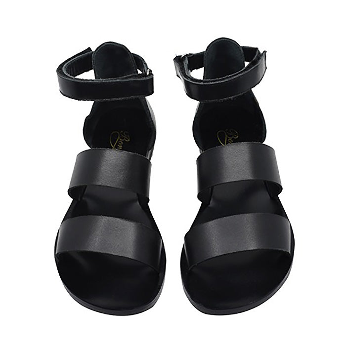 A pair of black leather sandals with straps across the foot and a velcro strap around the ankle from the front.