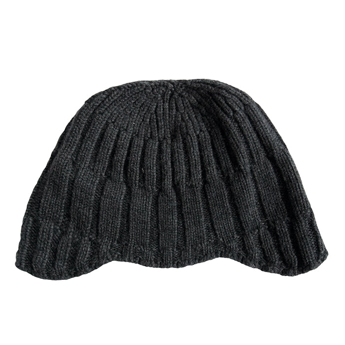 Black knit hat with scalloped edges from the back.