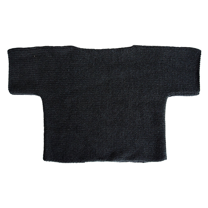 Black knit long sleeved sweater.