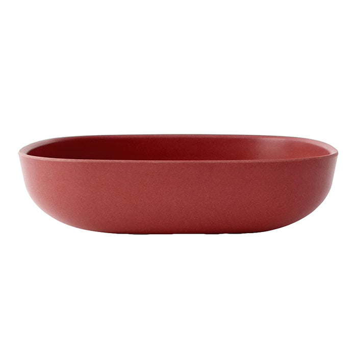 Red orange shallow bowl with a square shape and rounded edges.