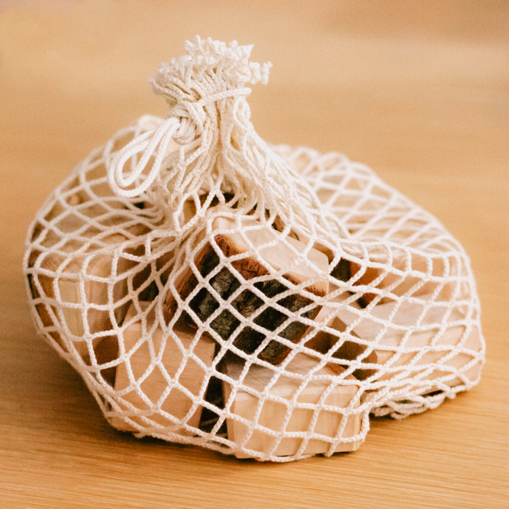 Grimm's Set Of 15 Wooden Blocks With Bark In Net Bag