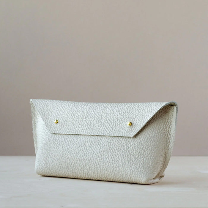 Cream leather clutch on sale bag