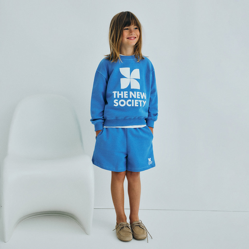 The New Society Child TNS Logo Shorts Iris Whisper Blue