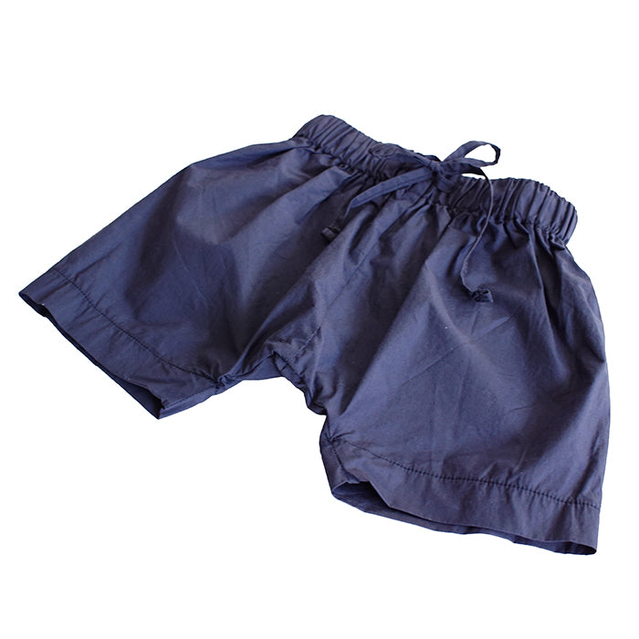 Pull on harem shorts in blue from the front.