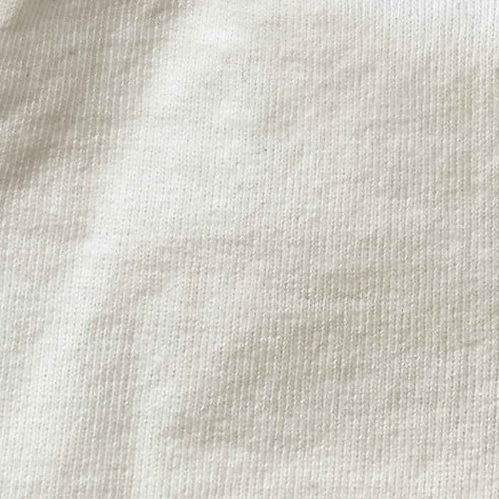 Close up of the white jersey fabric.