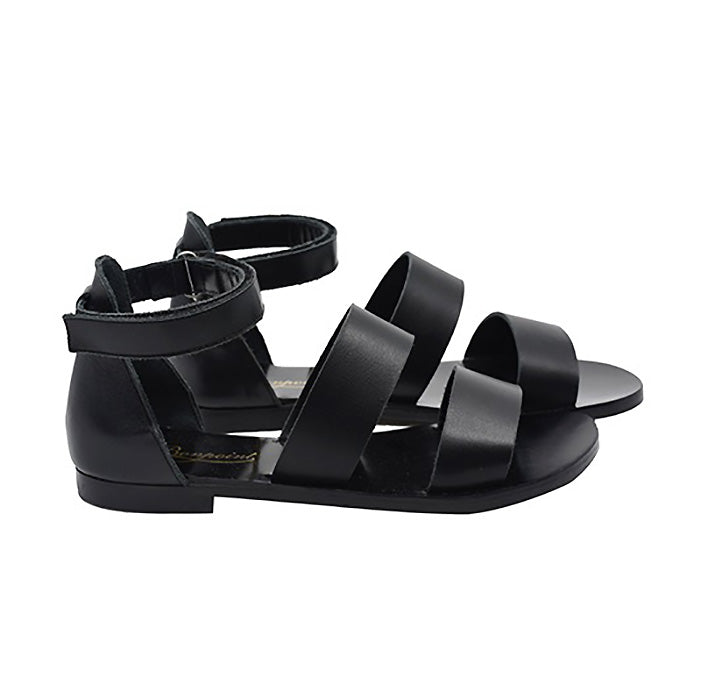 A pair of black leather sandals with straps across the foot and a velcro strap around the ankle from the side.