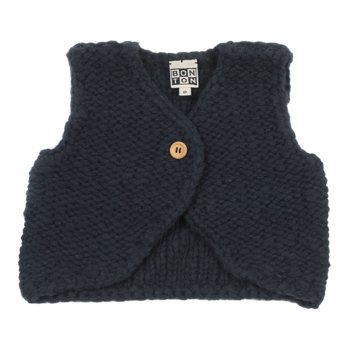 Navy blue knit vest with a single wooden button on the front.