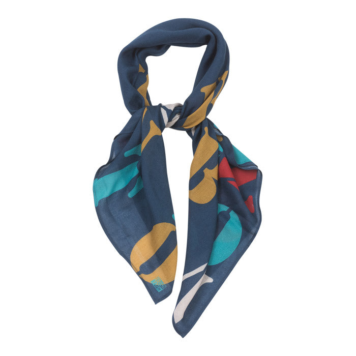 Navy blue tied scarf with an all over red, yellow and turquoise letter print.