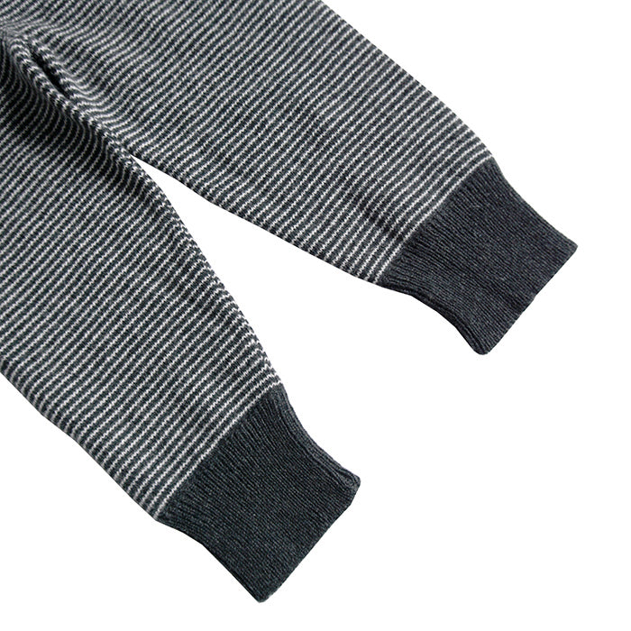 Close up of the wide grey leg cuffs.