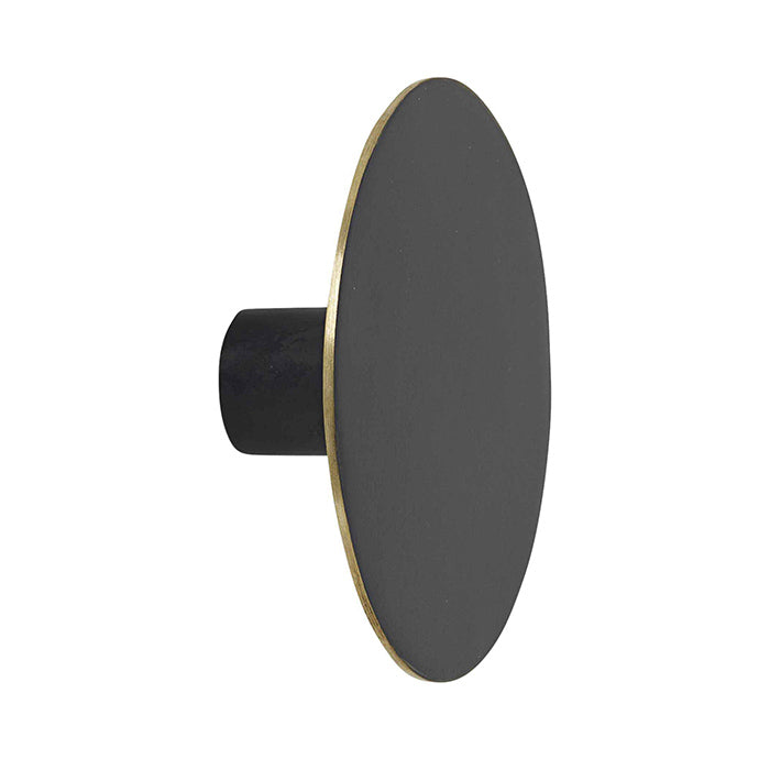 Round black wall hook.
