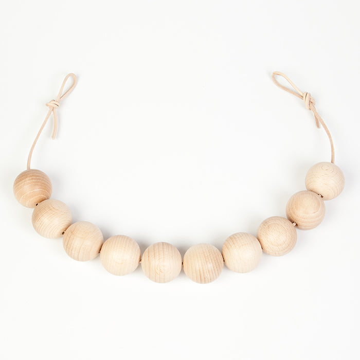 String of round wooden beads.