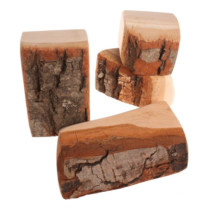 Close up of wooden blocks with bark attached.