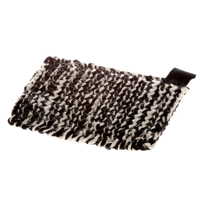 Black and white knit kettle holder.