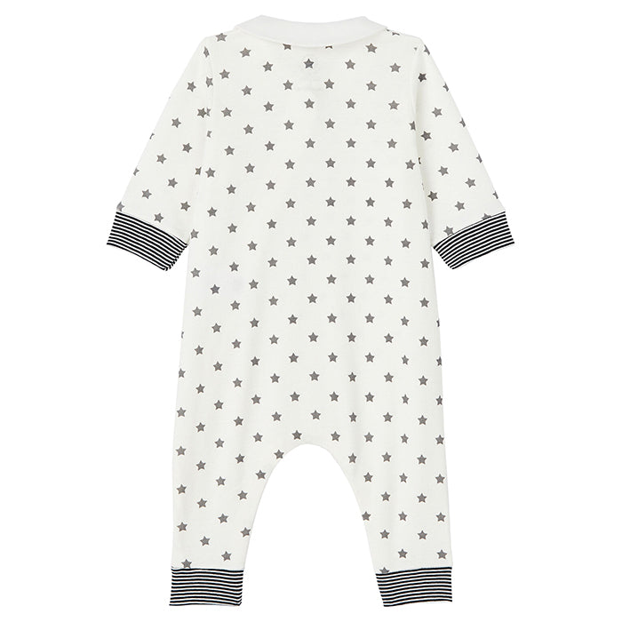 White long sleeved pyjama with long legs and a grey star print from the back.