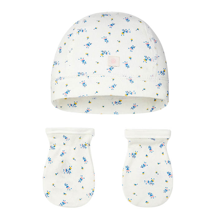 A baby gift set with a blue floral print beanie and mittens.