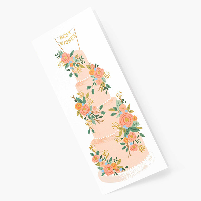A tall greeting card with a pink wedding cake.