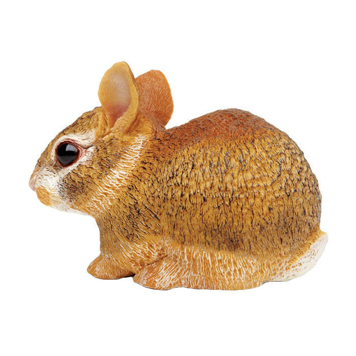 Plastic brown bunny toy figurine from behind.